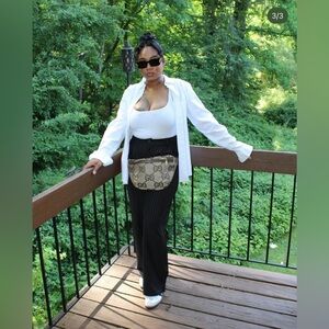 Pleated Pinstriped Trousers